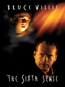 Movie poster for The Sixth Sense, starring Bruce Willis. Bruce Willis and Haley Joel Osment are against a black background with an orange glow in the upper-right corner. The title is written in white at the bottom.