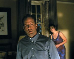 Scene in The Sixth Sense. Malcolm and his wife, Anna, are in their bedroom. They notice a strange presence in their bathroomand Malcolm investigates.
