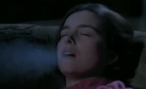 Scene in The Sixth Sense. Anna is sleeping and breathing out a cold breath.
